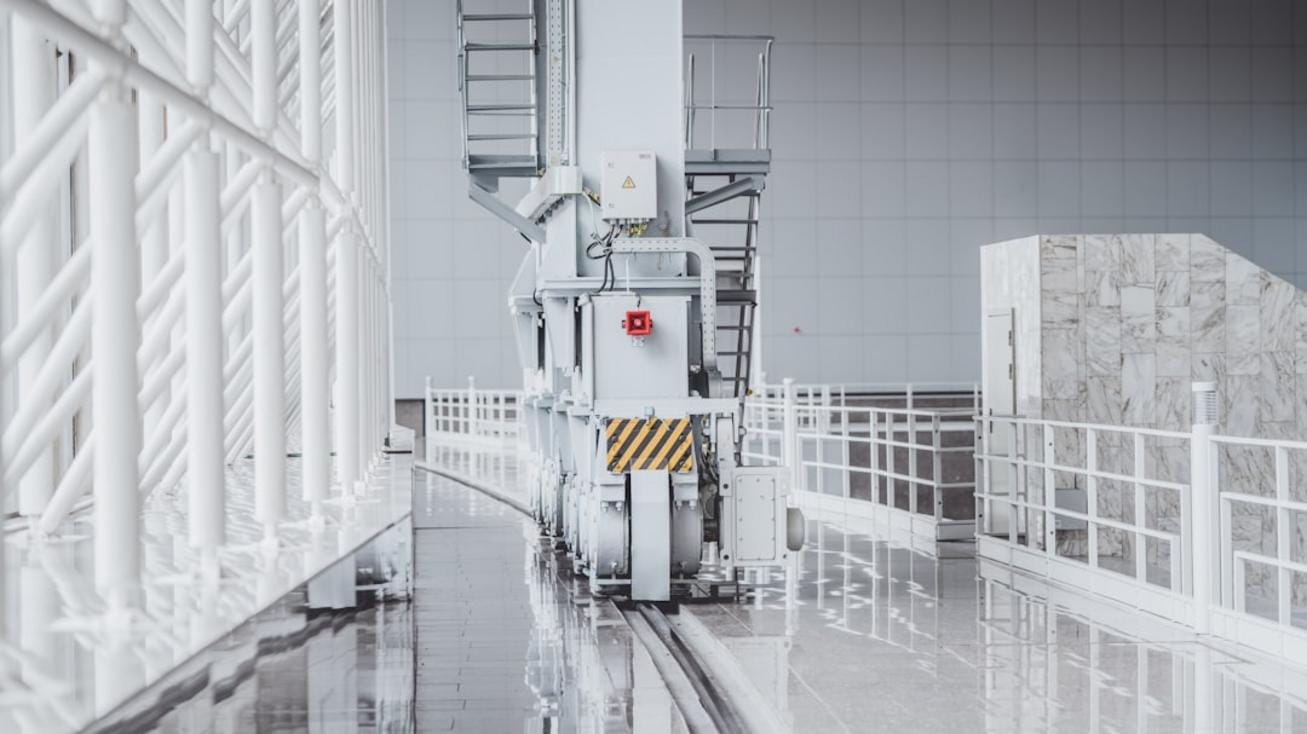 Close-up of automated concrete batching process in a modern plant with digital controls
